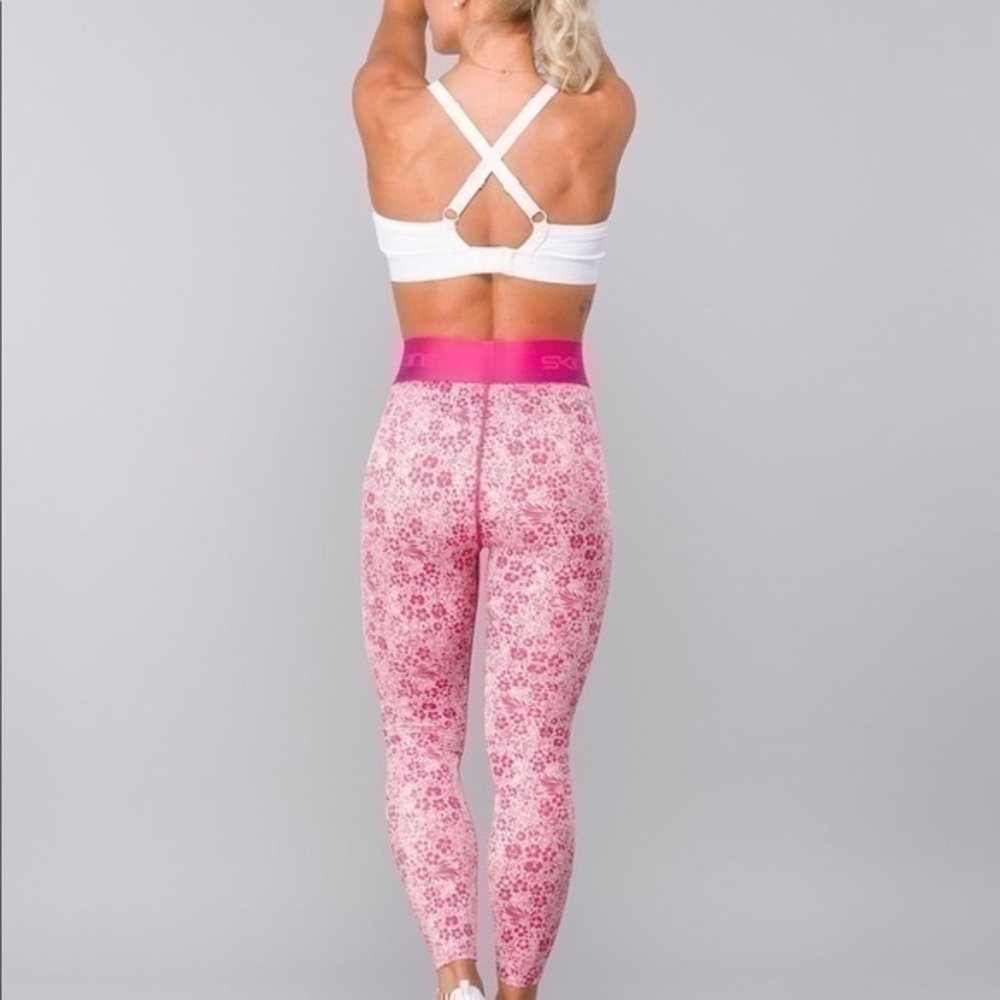 SKINS Pro Performance DNAmic Primary Compression Tights Floral gently preloved - Picture 14 of 14